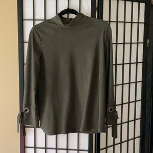 Live green suede top. It’s a size one in Chicos